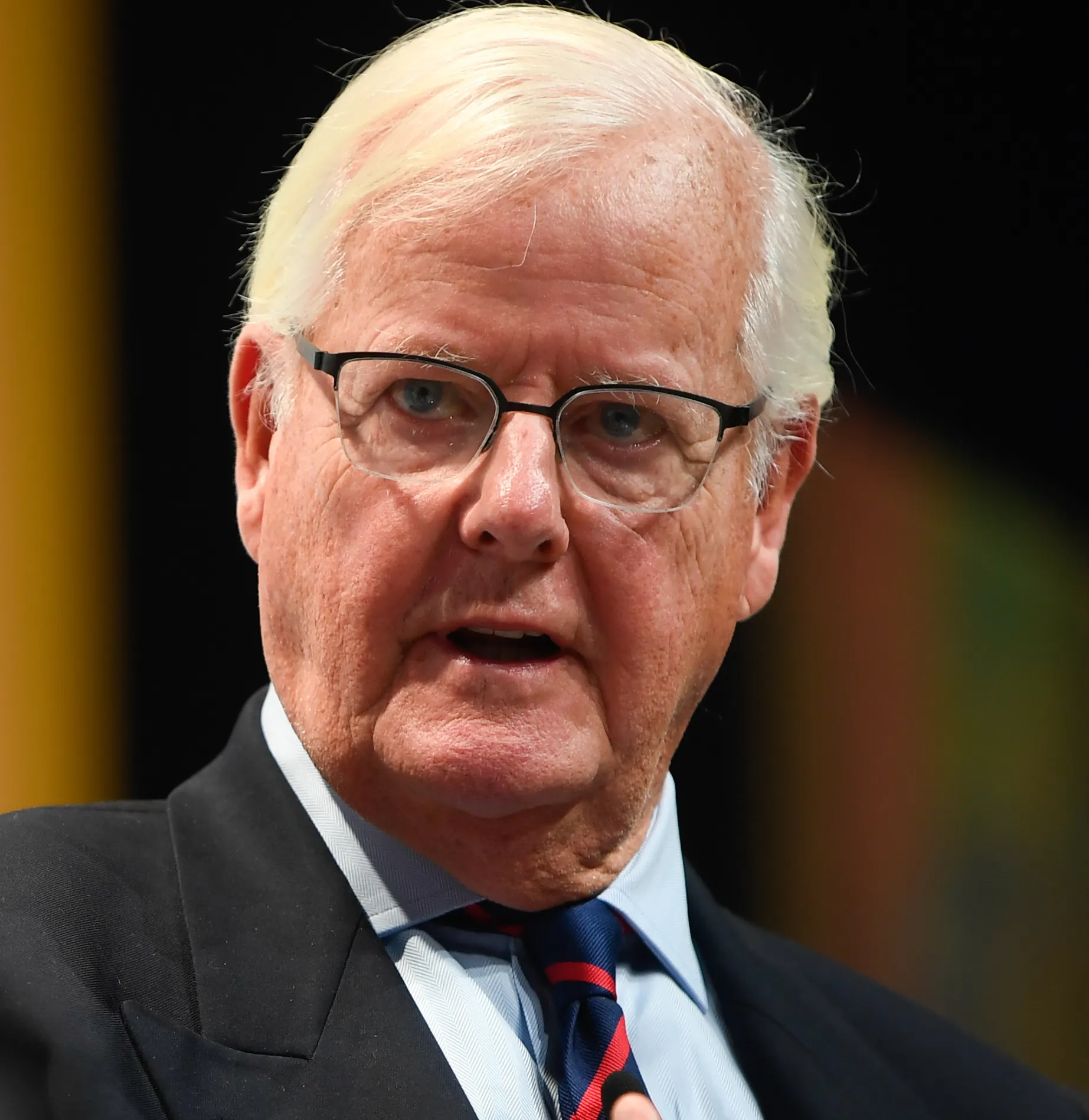 Os Guinness speaking, photographed at the Alliance for Responsible Citizenship Forum in 2023