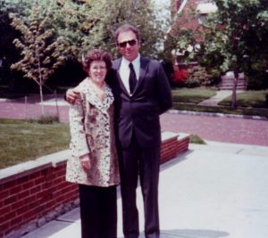 My parents in the front yard of my childhood home in Cleveland, sometime in the early 1980s. This is the only photograph I have of them together. Photo by Lisa McLaughlin-Bogucki.