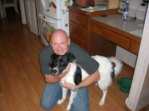 My brother and his dog, Bob, at home in 2009